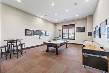 our apartments have a game room with a foosball table and a ping pong table